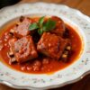 Свиные ребрышки в томатном соусе