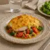 Куриное филе с овощами под сырной шапкой